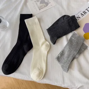 Solid color ribbed crew socks set, comfortable cotton blend daily wear casual socks for women.