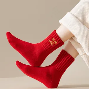 Calcetines de lana rojo vivo para hombre y mujer, calcetines de invierno gruesos y cálidos.