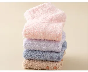 Coral fleece winter floor socks stacked detail, soft fuzzy candy color anti slip grip.