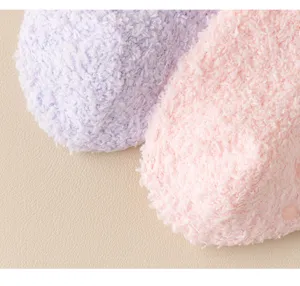 Cozy winter fuzzy floor socks detail, thickened soft coral fleece with anti-slip grip.