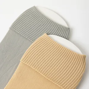 Solid color cotton two-toe split tabi socks for women, thin breathable mid-calf design.