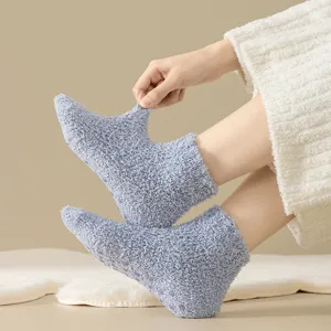 Thickened coral fleece non-slip floor socks for women, warm winter candy color fuzzy home socks.
