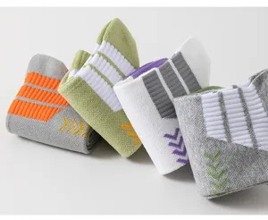 Men's athletic basketball crew socks with ribbed cushioning and breathable sweat-wicking knit fabric.