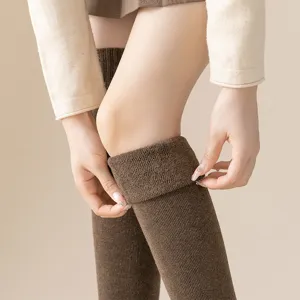 Thickened thermal over-the-knee socks for women, cozy loop pile long winter stockings.