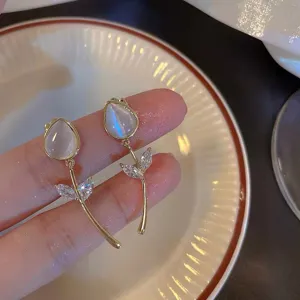 Korean style exquisite tulip flower earrings with sparkling rhinestones and white opal stones.