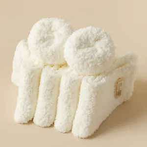 Cozy coral fleece warm socks for women, thick fluffy mid-calf winter socks for home floor.