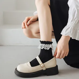 Cute Lolita JK uniform socks with delicate white lace trim and classic Mary Jane shoes.