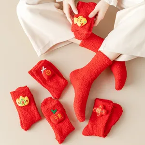 Festive red coral fleece mid-tube socks with cute 3D handmade decorations for couples.