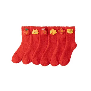 Red festive coral fleece socks with cute 3D New Year decors, warm winter couple socks main view.