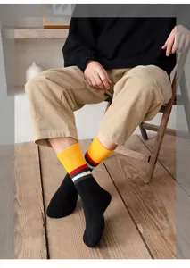 Chaussettes mi-hautes épaisses pour hommes, chaussettes d'hiver chaudes à blocs de couleurs.