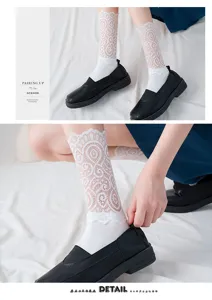 White Lolita lace mid-tube socks detail view, sweet cute floral mesh design for women daily wear.