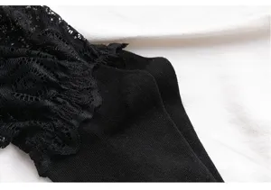 Close-up detail shot of black lace ruffle sock knit texture showcasing exquisite Japanese style.
