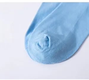 Light blue women's socks detail shot, soft knitted fabric, comfortable daily wear item.