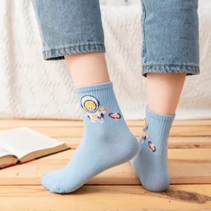 Cute cartoon astronaut crew socks for women, Harajuku style blue casual cotton socks.