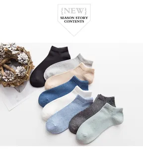 Detailed shot of comfortable cotton ankle socks in multiple assorted colors for daily wear.