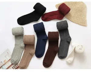 Detail view of Japanese style women retro thick knit over the knee socks multi color fashion.