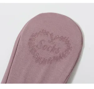 Women summer thin invisible boat socks with silicone anti-slip floral heart sole detail.