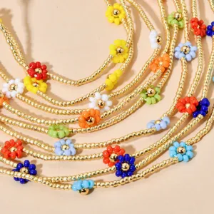 Bohemian multi-layer gold seed bead choker necklace with colorful daisy flower charms for daily wear.