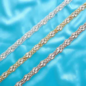 Close-up details of sparkling rhinestone trim appliques in silver, gold, and rose gold.