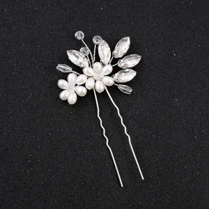Crystal pearl hair fork detail, exquisite handmade bridal accessory with sparkling stones.