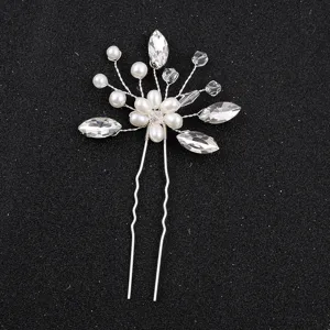 Exquisite bridal hair fork embellished with pearls and sparkling crystals detailed view