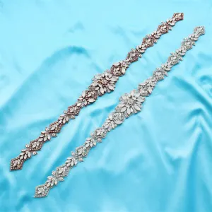 Exquisite rhinestone bridal belt applique detail showing sparkling crystals on delicate backing.