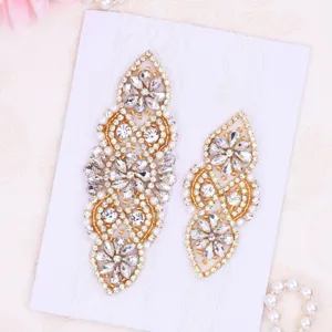 Exquisite rhinestone lace bridal garter set, elegant wedding decorative accessory.