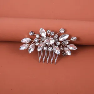 Detailed close-up view of the silver rhinestone bridal hair comb featuring clear crystal leaf design.