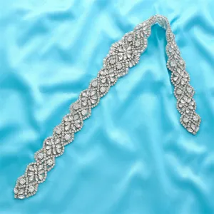 Exquisite crystal rhinestone bridal belt detail, sparkling diamond appliqué trim for wedding dress.