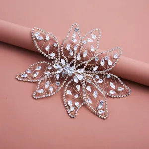 Intricate rhinestone leaf hair clip detail, shimmering crystal bridal wire hair accessory.
