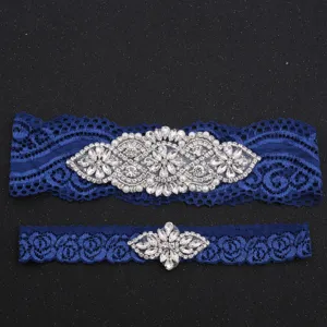 Bridal blue lace garter set with sparkling rhinestones for wedding party main view.