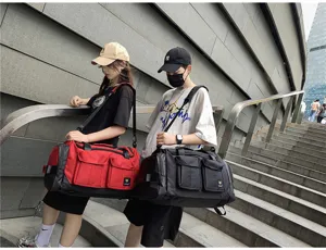 Large capacity travel duffel bag for men and women, multifunctional gym fitness sports bag.