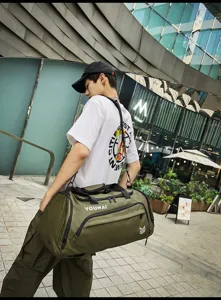 Large capacity travel duffel bag for men, outdoor fitness gym bag with wet dry separation.
