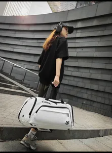 Large capacity travel duffel bag for gym and outdoor sports with durable straps and compartments.