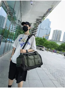 Large capacity tactical travel duffel bag with multi pockets, ideal for gym and business trips.