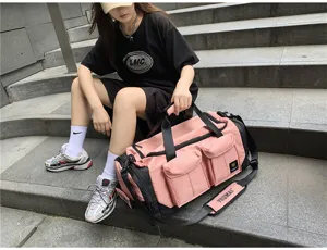 Large capacity travel duffel bag for men and women, stylish pink gym fitness sports bag.