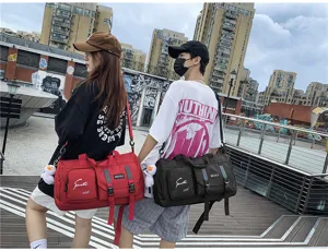 Multifunctional travel duffel bag for men and women, large capacity fitness sports luggage.