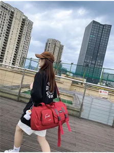 Large capacity red travel duffel bag multi-functional waterproof gym sports bag for women.