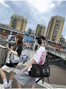 Detailed view of the large capacity travel duffel bag showcasing stylish design and street scene.