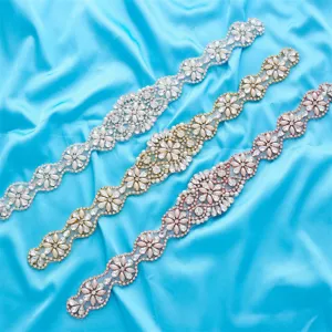 Bridal rhinestone pearl applique sash belt detail showing silver gold and rose gold variants.
