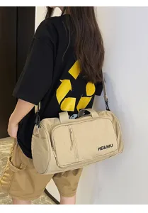 Large capacity travel duffel bag in khaki, lightweight gym and sports bag with shoulder strap.