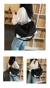 Casual black travel duffel bag for women, large capacity fitness gym bag with white corner patches.