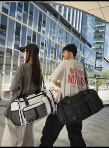 Large capacity travel duffel bag for men and women, perfect for weekend trips and gym.