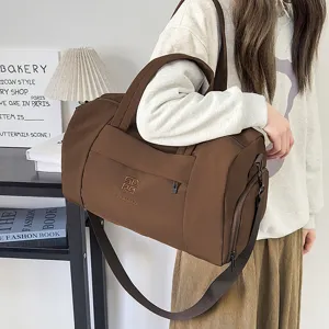 Grand sac de voyage de grande capacite pour sport fitness court sejour couleur marron.