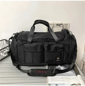 Large capacity black travel duffel bag with multi pockets, perfect for gym and business trips.