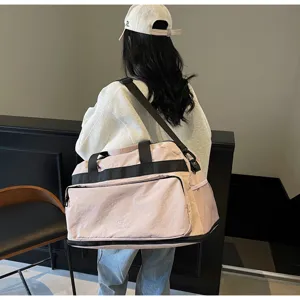 Grande borsa da viaggio con design espandibile e pratico, borsa impermeabile rosa per donne.