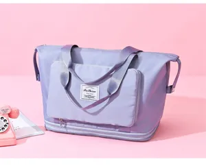 Grand sac de voyage fourre-tout impermeable pliable sac a bagages sac weekend leger.