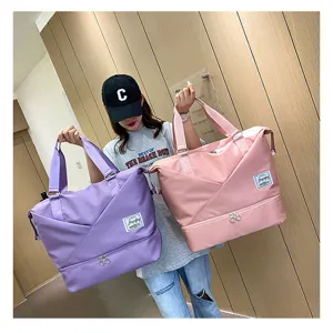 Large capacity travel duffel bag for women, portable fitness bag with dry wet separation.