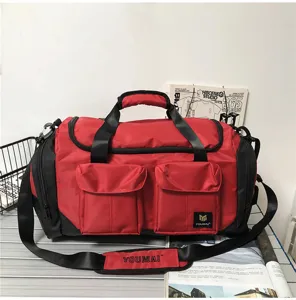 Large capacity travel duffel bag for gym, business trips and outdoor sports with shoulder strap.