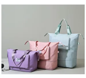 Grand sac de voyage pliable capacite etanche sac a main leger pour courts voyages